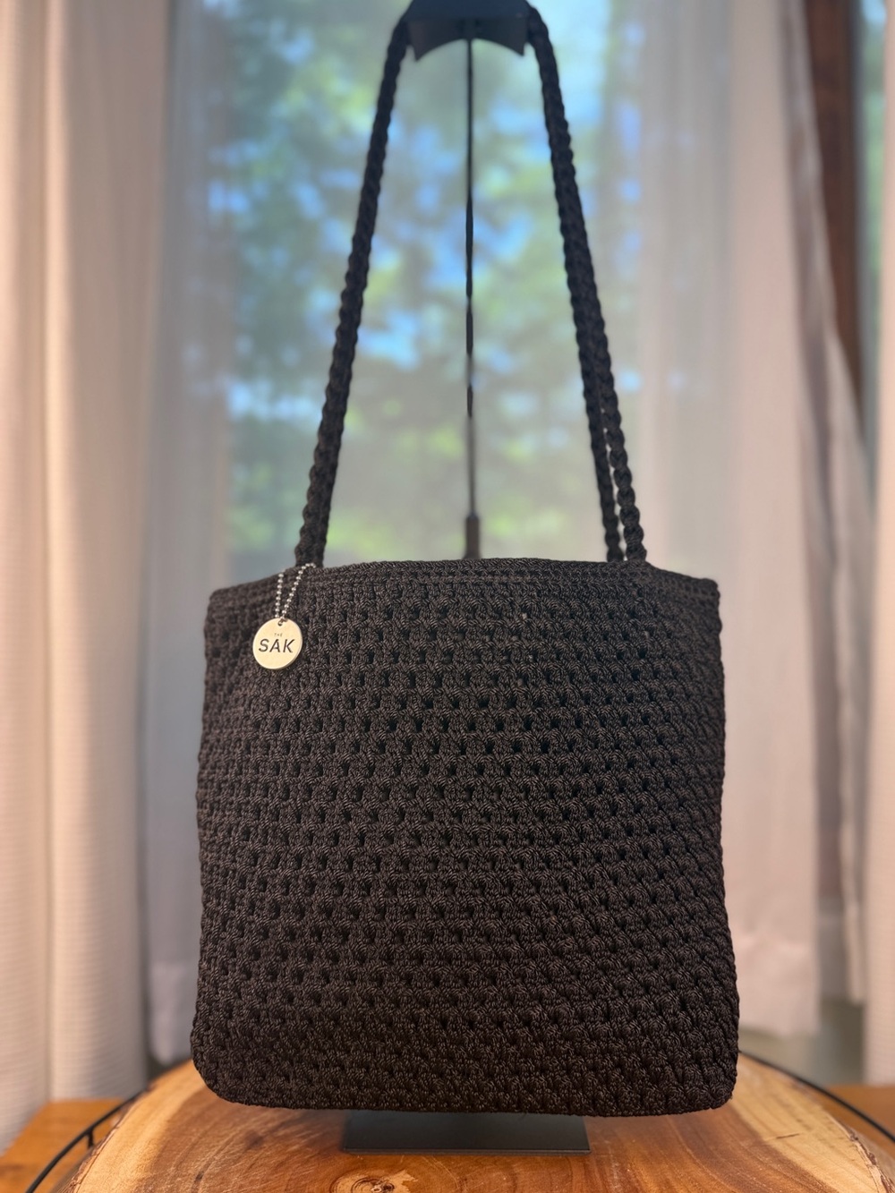 The Sak Black Crocheted Shoulder Bag with Braided Straps